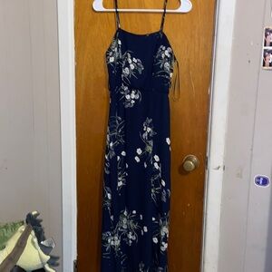 A navy blue dress with cute floral print on it